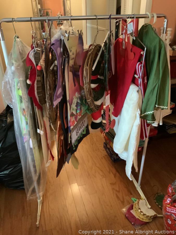 Clothes rack and everything on it Auction | Shane Albright Auctions