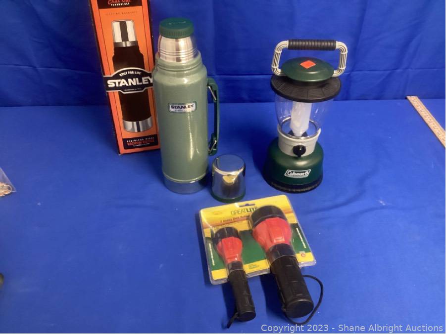 At Auction: COLEMAN THERMOS