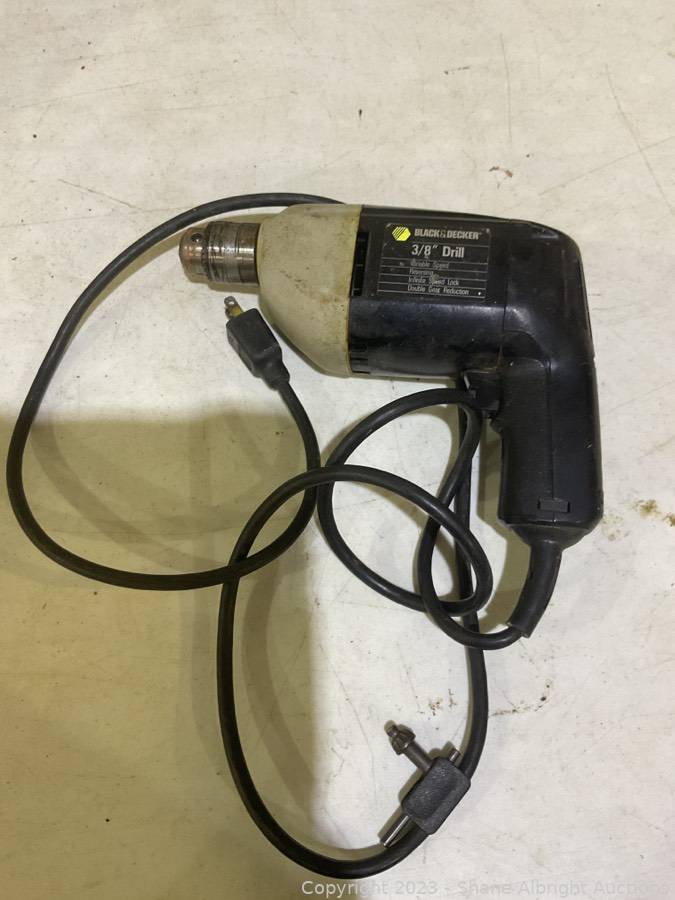 Sold at Auction: VINTAGE BLACK AND DECKER CORDED DRILL